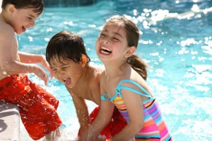 kids swimming in heated pool